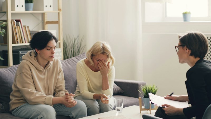 Adults in a supportive group conversation